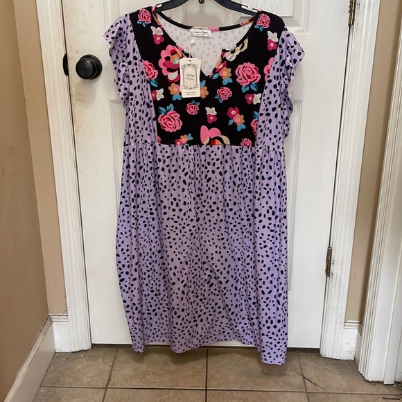 Dresses & Skirts - NWT. Adorable print dress.